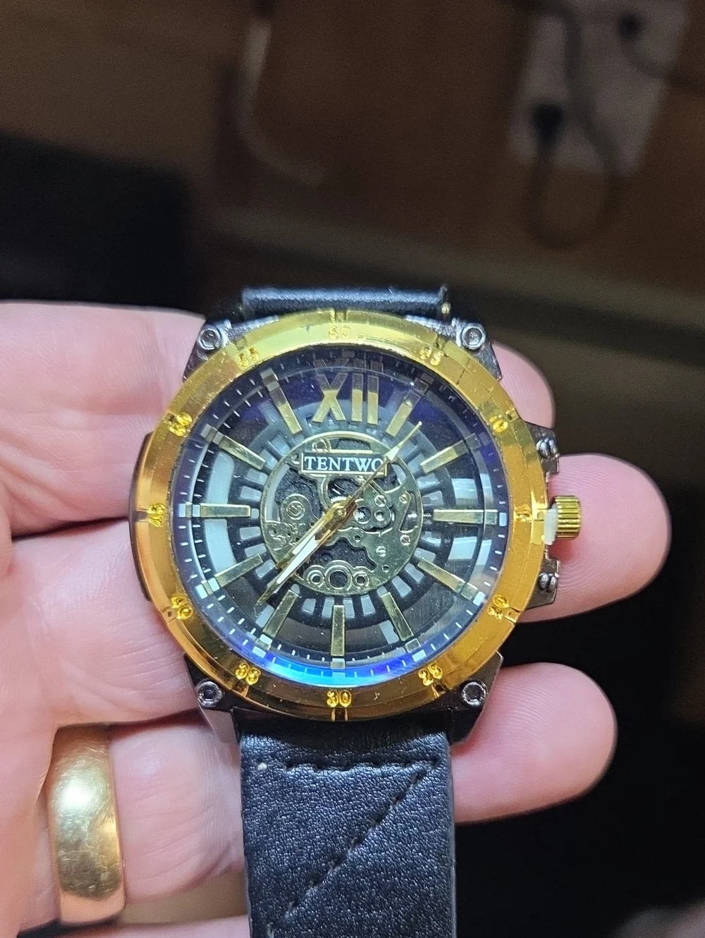 TENTWO Gold Bezel Skeleton Dial Watch - Black Leather Strap
